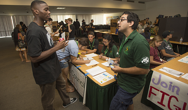 Student at a science open house